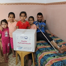 صندوق الخير- دار الفتوى يوزع 1143 سلة غذائية في قطاع غزة